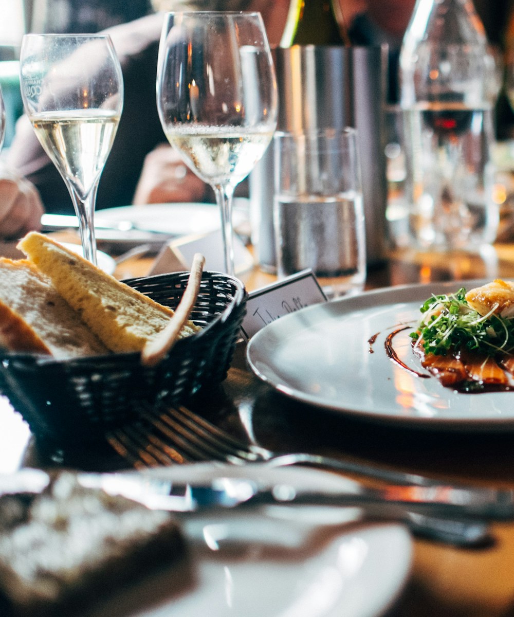 A warm dinner gathering around a table