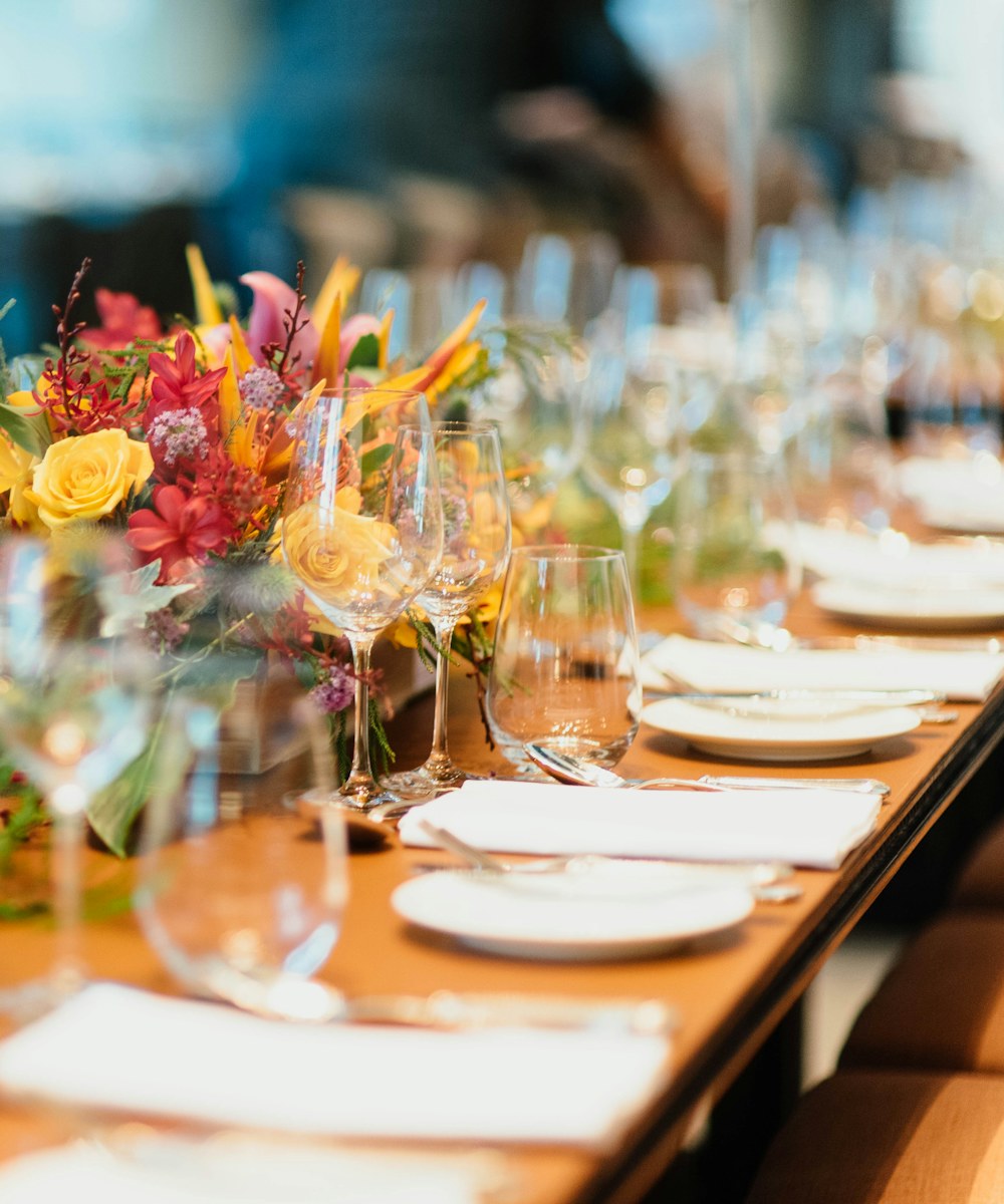 Flowers and place settings at a wedding reception